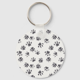 Voetafdrukken van poot: Hond monochroom naadloos. Sleutelhanger