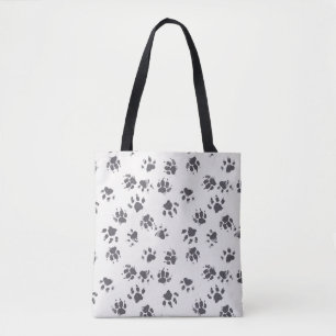 Voetafdrukken van poot: Hond monochroom naadloos. Tote Bag
