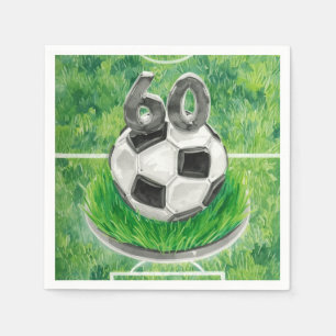 Voetbal 60ste verjaardag met ballen op groen servet