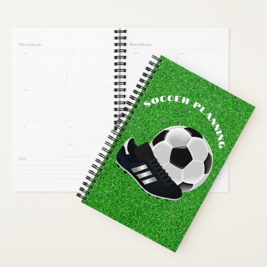 Voetbal en Cleats op het veld Planner (Display)