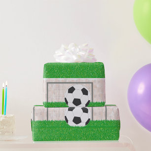 Voetbal en doelpaal op groen grasveld cadeaupapier