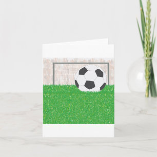 Voetbal en doelpaal op groen grasveld kaart