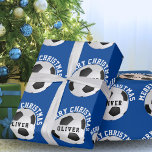 Voetbal Football Balls Kinder naam Blue Christmas Cadeaupapier<br><div class="desc">Voetbal Football Balls Kinder naam Blauw Kerst Wrapping Papier Bladen. Personaliseer met jouw naam. U kunt de tekst Merry Christmas veranderen.</div>