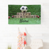 Voetbal met bal op de groene partij spandoek (Insitu)