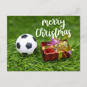 Voetbal met cadeau voor prettige kerst briefkaart