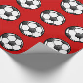 voetbal op rood cadeaupapier (Hoek)