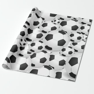 voetbal over cadeauverpakking cadeaupapier