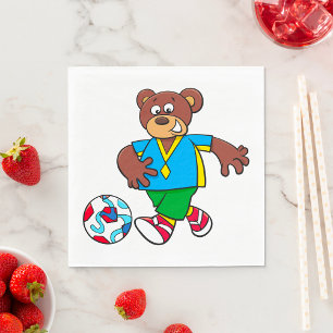 Voetbalbeer die voetbal speelt in sportoutfit servet