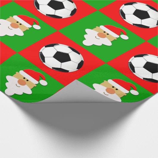 Voetballen en kerstmis rood en groen kerstfeest cadeaupapier (Hoek)