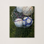 Voetballen in netto legpuzzel (Verticaal)