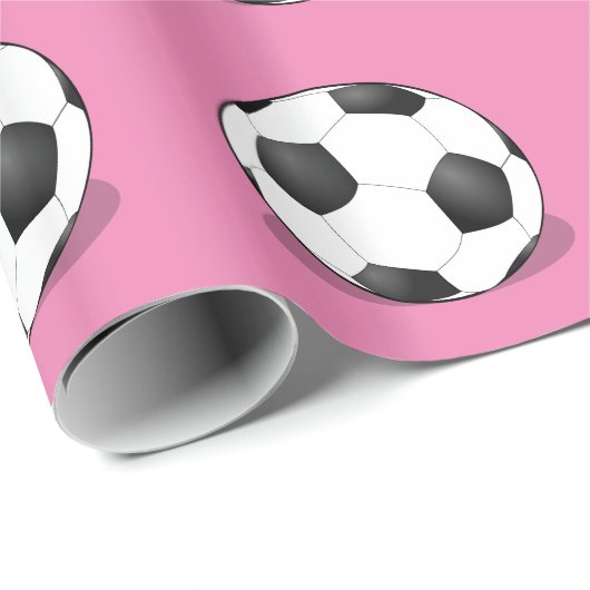 Voetballen op roze achtergrond cadeaupapier (Rol Hoek)