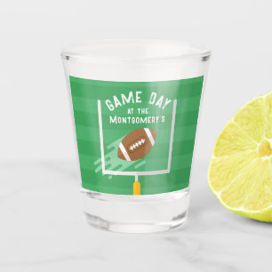 Voetbalpunt na staanders shot glas