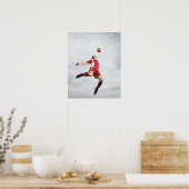 Voetbalspeler en voetbal in de lucht poster (Keuken)