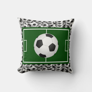 Voetbalveld en ballen kussen