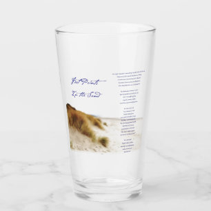 voetsporen in het zand glas