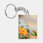 Voetvogel op een bloeiend plant sleutelhanger (Voorkant Links)