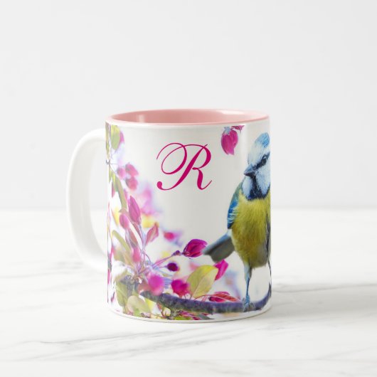Vogel en roze bloesems tweekleurige koffiemok (Voorkant links)