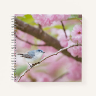 Vogel in roze bloesem notitieboek