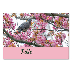 Vogel op een bloeiende Sakura-tafelkaart Kaart