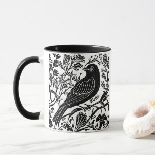 Vogel op een tak met bloemen in zwart en wit mok