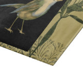 Vogel op zwarte en  achtergrond snijplank (Hoek)