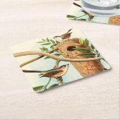 Vogelpaar op een nestveld op een tak kartonnen onderzetters (Schuin)