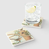 Vogelpaar op een nestveld op een tak stenen onderzetter (Zijkant)