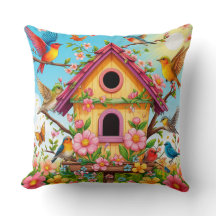 Vogels die rond een vogelhuisje zitten