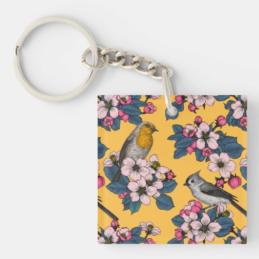 Vogels en bloesems op geel sleutelhanger (voorkant)