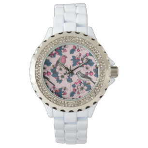 Vogels en bloesems op roze horloge