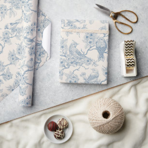 Vogels en kersenbloesem in blauw en wit cadeaupapier