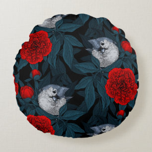 Vogels en rode pioenbloemen met blauwe bladeren rond kussen