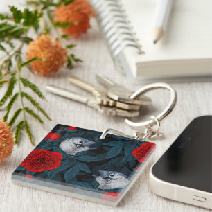 Vogels en rode pioenbloemen met blauwe bladeren sleutelhanger