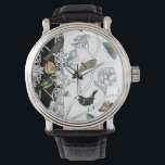 Vogels en vlinder op een zwarte en witte achtergro horloge<br><div class="desc">Kunstenaar Chariklia Zarris is een getalenteerde schilder en ontwerper. Ze schildert graag vogels en wilde dieren en dit afbeelding is geen uitzondering. De levendige kleuren van vogels en vlinders worden nog versterkt door de zwarte en witte takken op de achtergrond.</div>