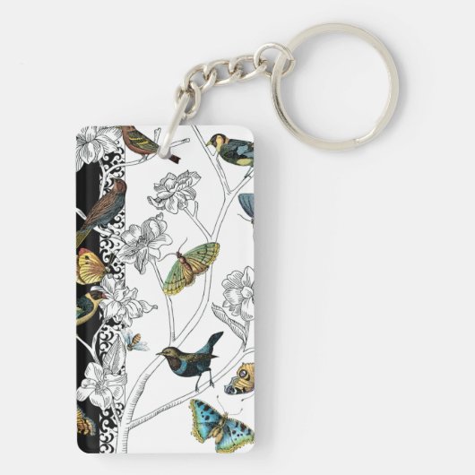 Vogels en vlinder op een zwarte en witte achtergro sleutelhanger (achterkant)