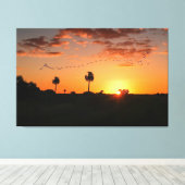 Vogels oversteken bij zonsondergang canvas afdruk (Insitu (Houten vloer))