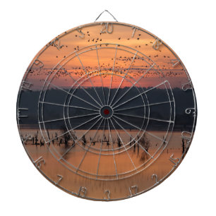 Vogels tegen zonsopgang dartbord