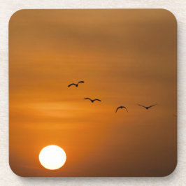Vogels vliegen in zonsondergang drankjes onderzetter