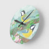 Vogels zingen op een bloeiende boomtak  ronde klok (Hoek)