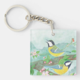 Vogels zingen op een bloeiende boomtak sleutelhanger