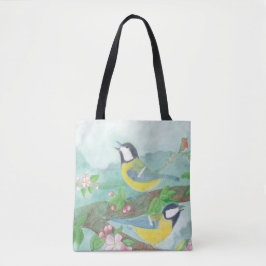 Vogels zingen op een bloeiende boomtak tote bag
