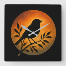 Vogelsilhouet boven volle maan