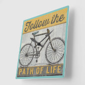 Volg het pad van het levensaanbod vierkante klok (Hoek)