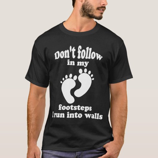 Volg mijn voetstappen niet in de muren t-shirt (Voorkant)
