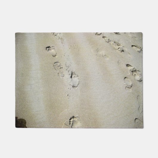 Volgen in zand deurmat (Voorkant)