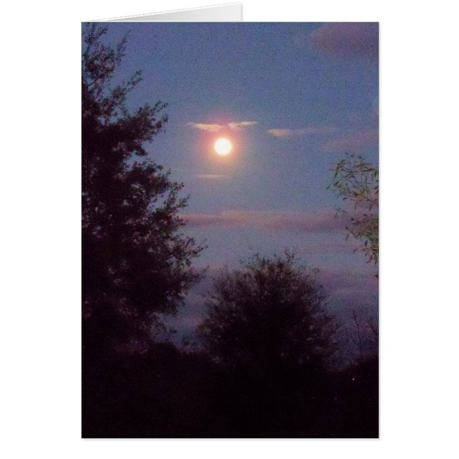 volle Wolf moon stijgend bij zonsondergang - op ee (Voorkant)