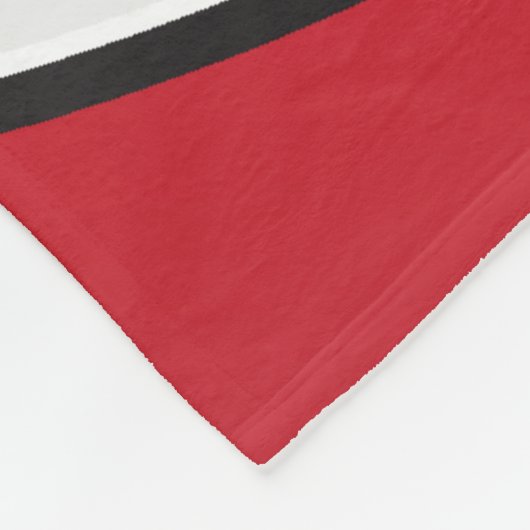 Volleybal 🏐 in een rood, wit en zwart fleece deken (Hoek)