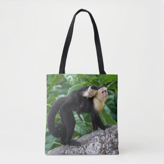Volwassen capuchin-aap die Baby op de rug draagt Tote Bag (Voorkant)