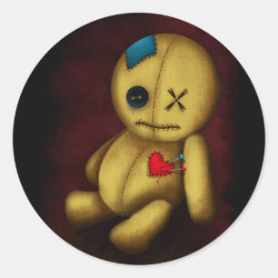Voodoo lappenpop met knopen, lapjes en spelden ronde sticker