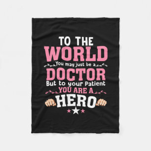 Voor de wereld kun je gewoon dokter worden. fleece deken